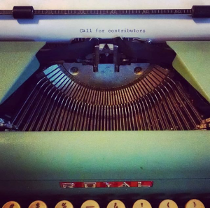Typewriter with page that reads "Call for contributors"